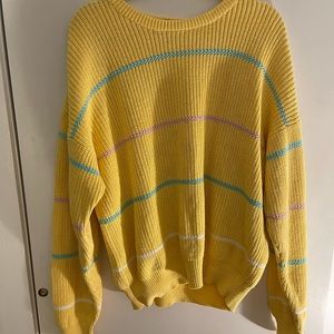 Thrifted yellow sweater with pink blue and white stripes